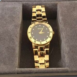 Gucci Gold Watch with Black Face
